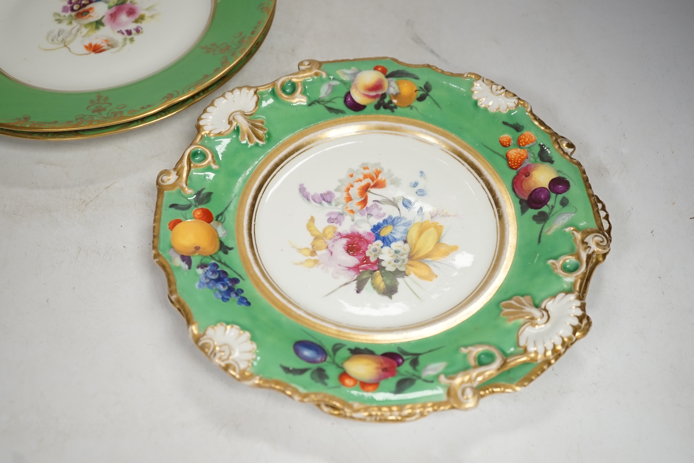 A group of English porcelain green ground dessert plates and dishes, largest 24cm diameter. Condition - fair